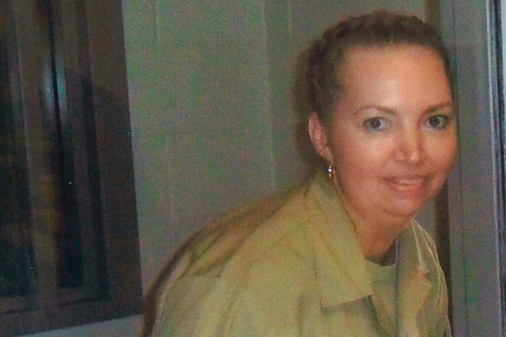 A photograph of federal death row prisoner Lisa Montgomery looking at the camera. 